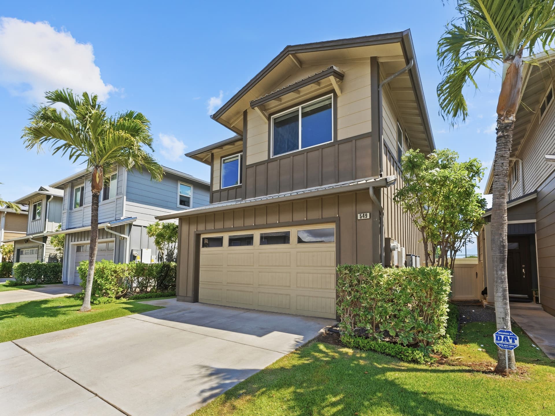 Front exterior with covered entry and garage